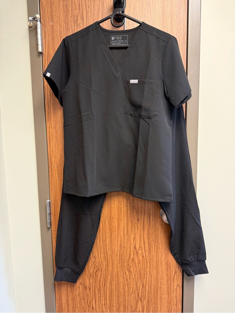 Women’s Black Figs top and trousers size medium reg
